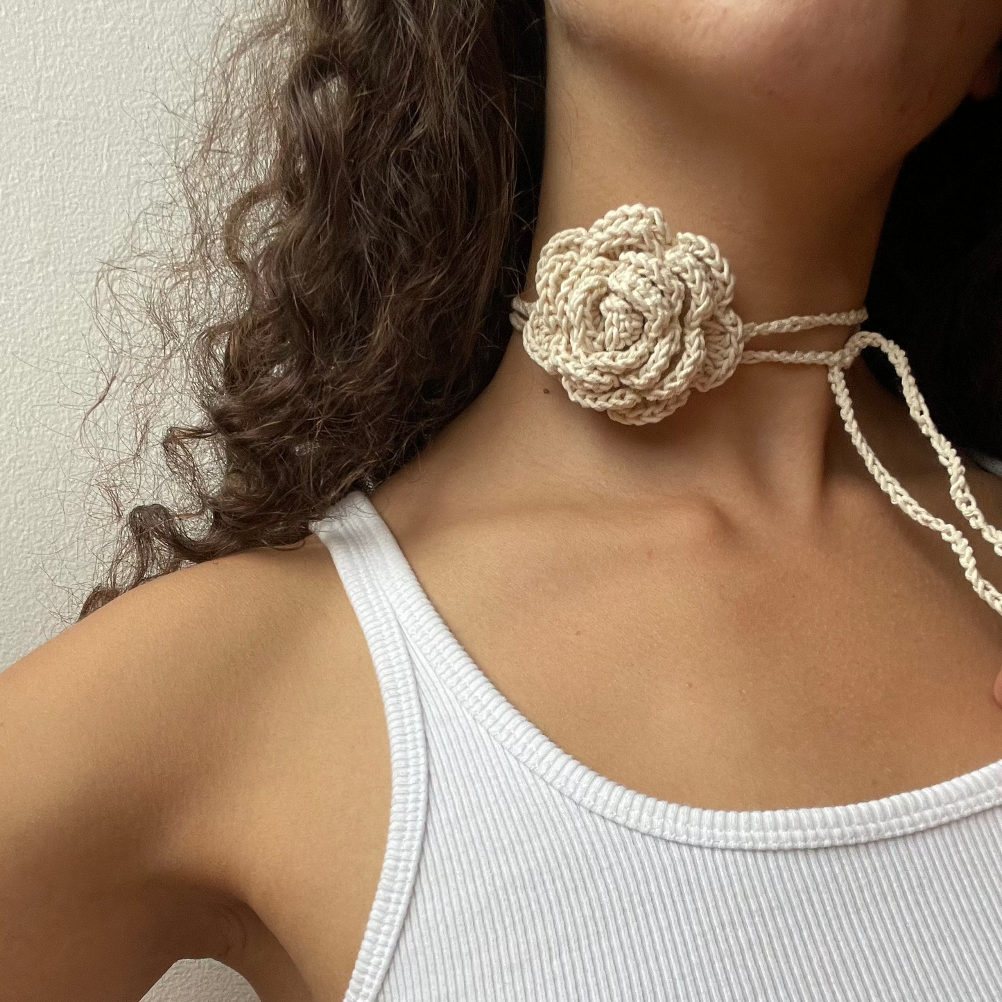 givéh knitwear handmade by female artisans in iran. knitwear for cool people. hand crocheted flower necklace/choker with undyed cotton yarn.
