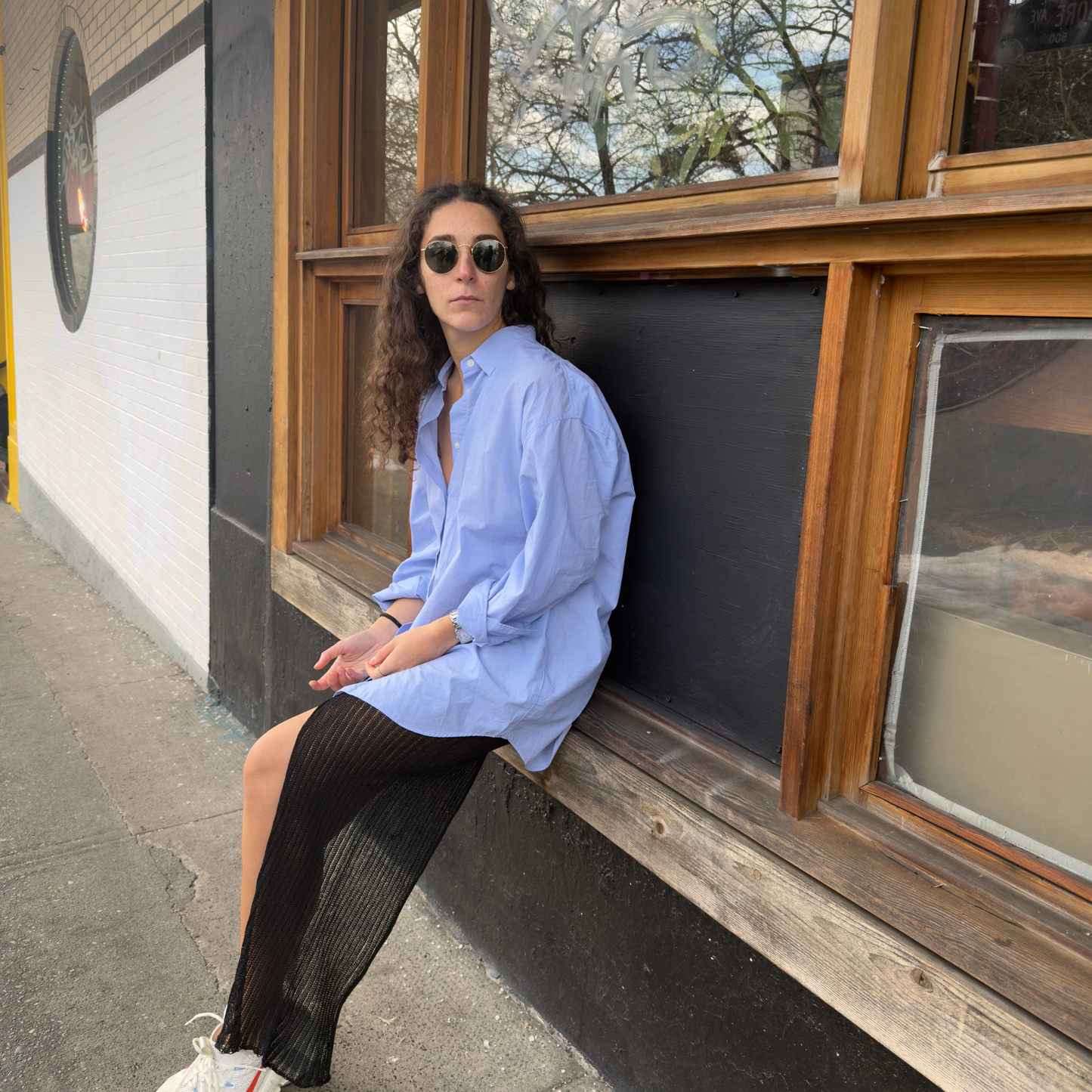 givéh knitwear handmade by female artisans in iran using only natural and recycled fibres. contemporary knitwear for cool people. black kaj skirt, asymmetrical organic cotton skirt. spring summer 2025 collection.