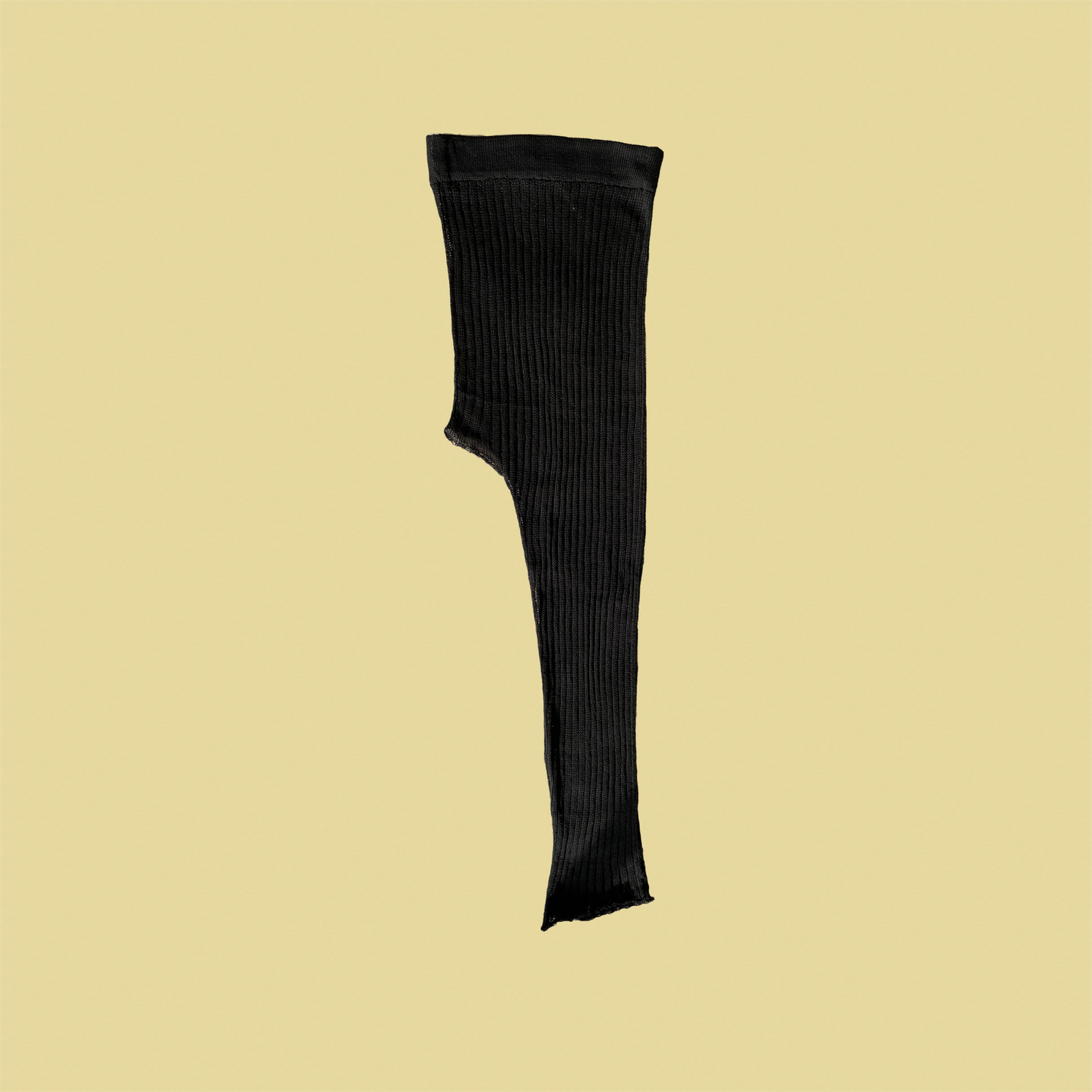 givéh knitwear handmade by female artisans in iran using only natural and recycled fibres. contemporary knitwear for cool people. black kaj skirt, asymmetrical organic cotton skirt. spring summer 2025 collection.
