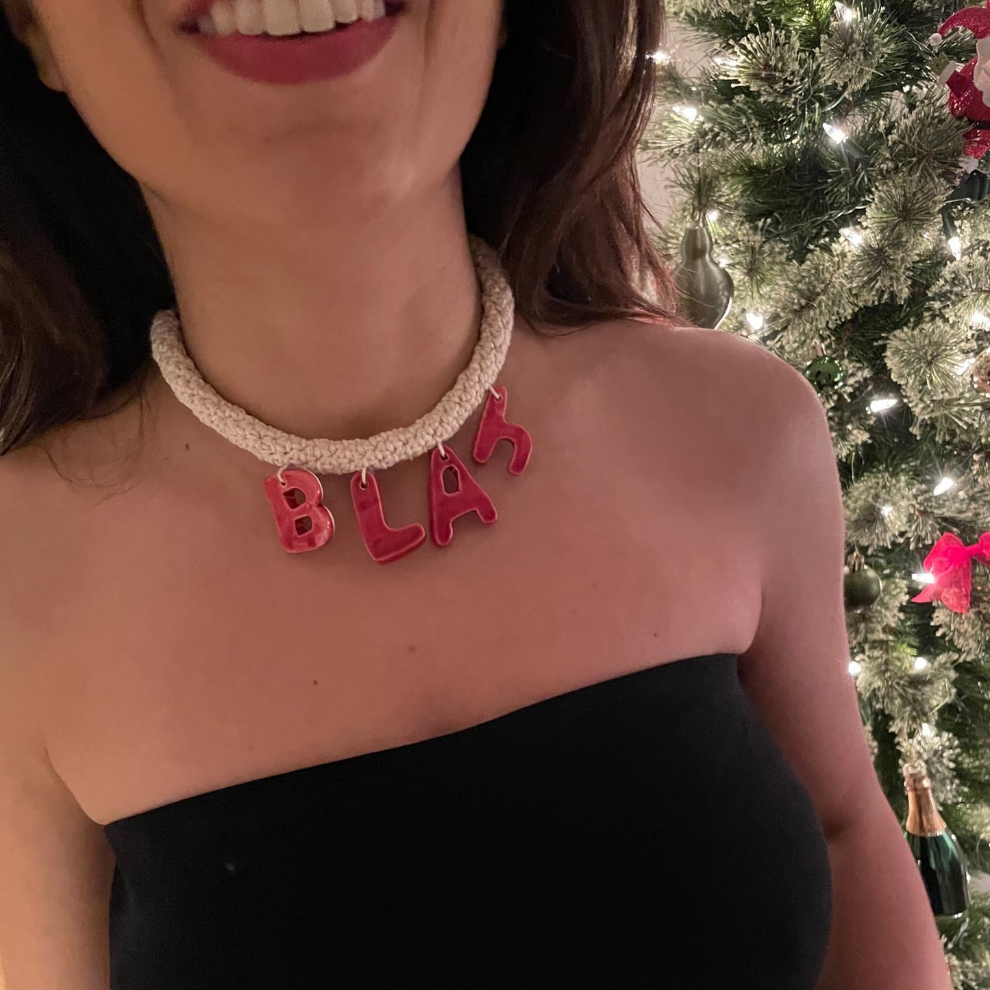 givéh knitwear handmade by female artisans in iran. blah hand crocheted undyed cotton necklace with handmade clay ceramic pendant.