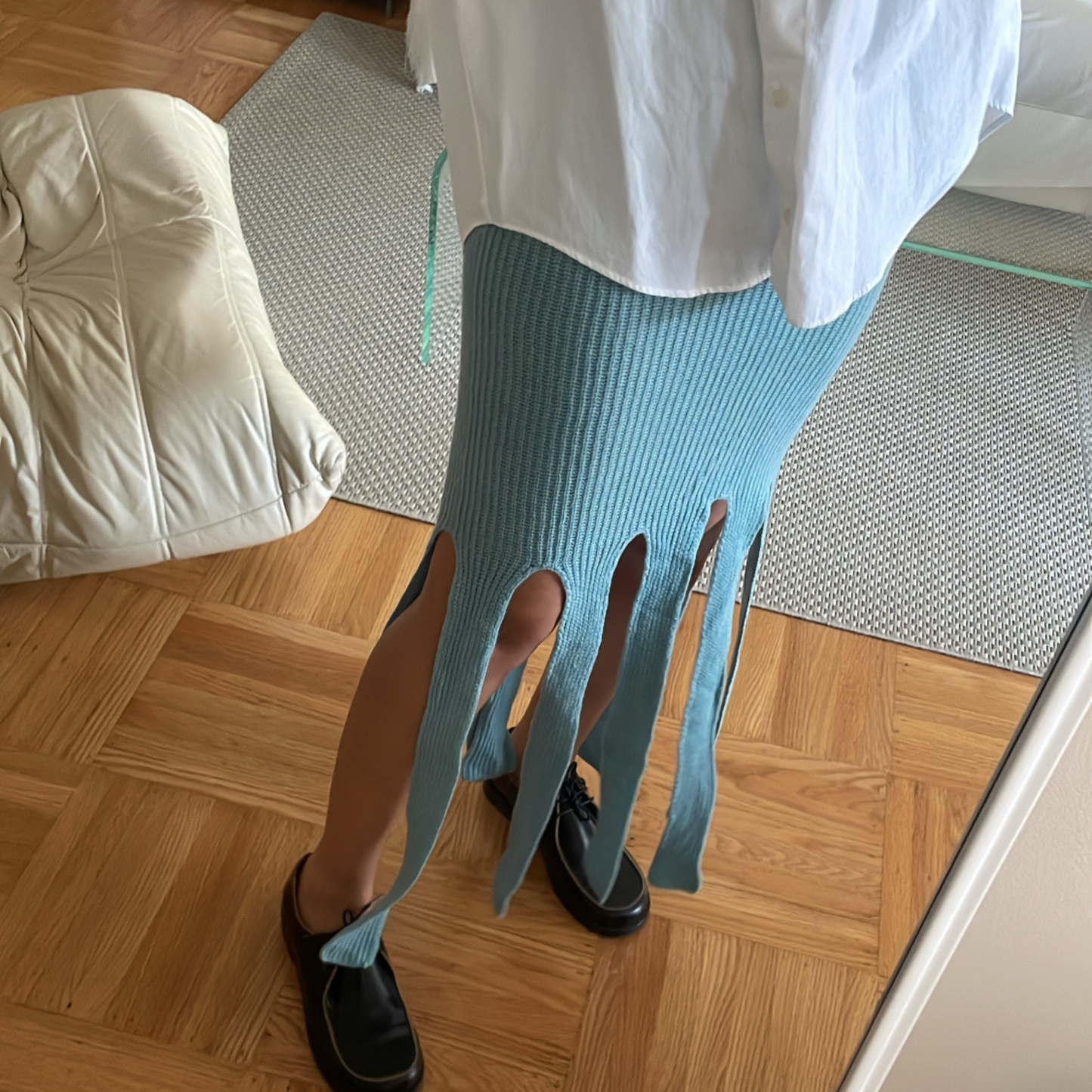 Givéh handmade 100% merino wool ribbed midi skirt by female artisans in Iran, autumn blue with hand crocheted edges and vertical slits