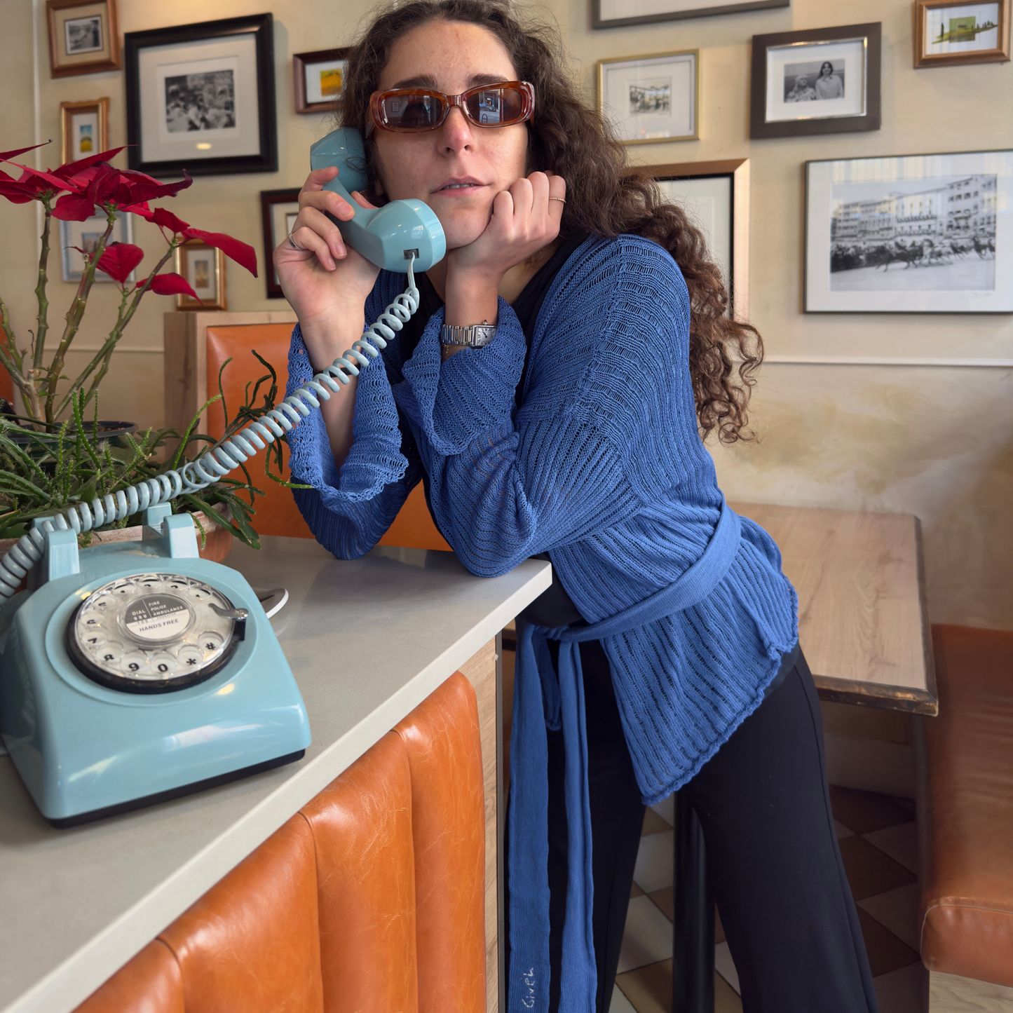 givéh knitwear handmade by female artisans in iran using only natural and recycled fibres. contemporary knitwear for cool people. darya cardi, blue knit cardigan with belt made of organic cotton yarn. spring summer 2025 collection.