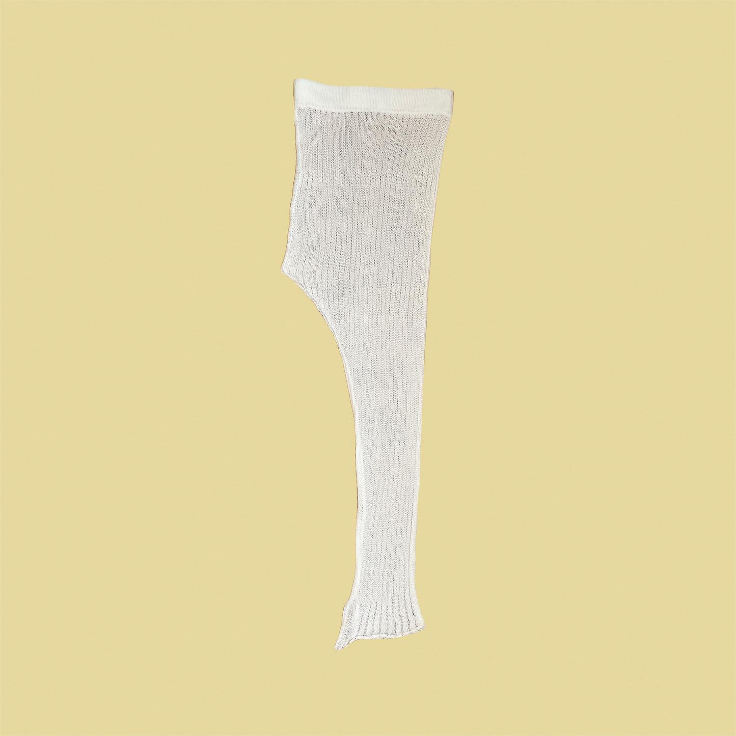 givéh knitwear handmade by female artisans in iran using only natural and recycled fibres. contemporary knitwear for cool people. white kaj skirt, asymmetrical organic cotton skirt. spring summer 2025 collection.