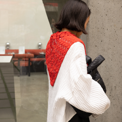 Givéh knitwear red cotton hand crocheted mini scarf by female artisans in Iran, openwork crochet wrap styled at the waist