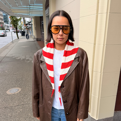 Givéh handmade merino wool cashmere-blend mini scarf by female artisans in Iran, hand embroidered lily detail in a red stripe