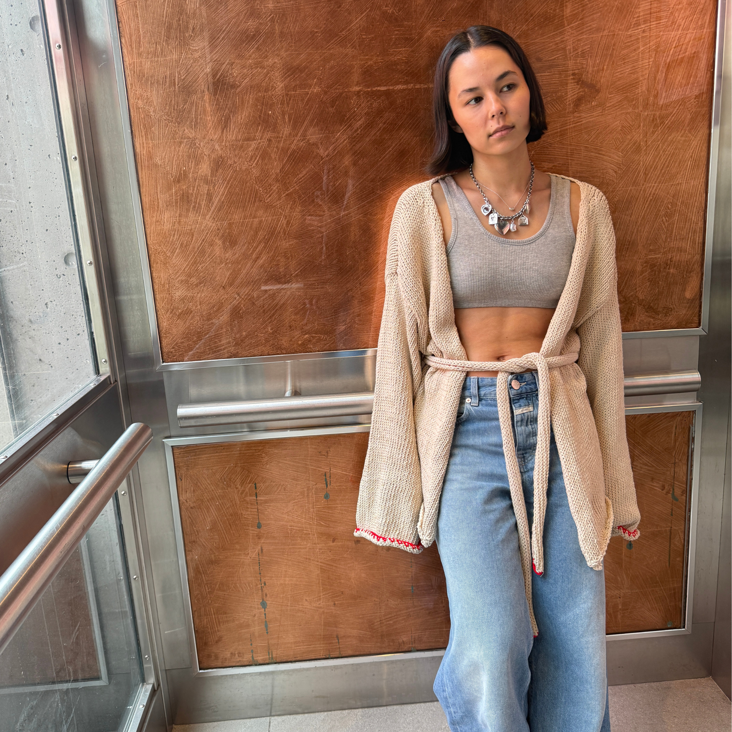 Givéh knitwear cotton hand knit cardigan by female artisans in Iran, belted wrap style with wide sleeves and open front, relaxed everyday layering piece