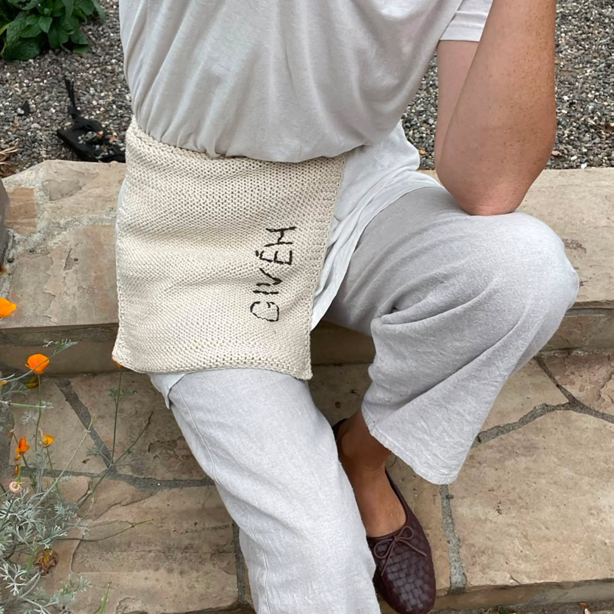 Givéh handmade 100% natural undyed cotton crossbody bag by female artisans in Iran, hand crocheted adjustable strap with hand embroidered logo
