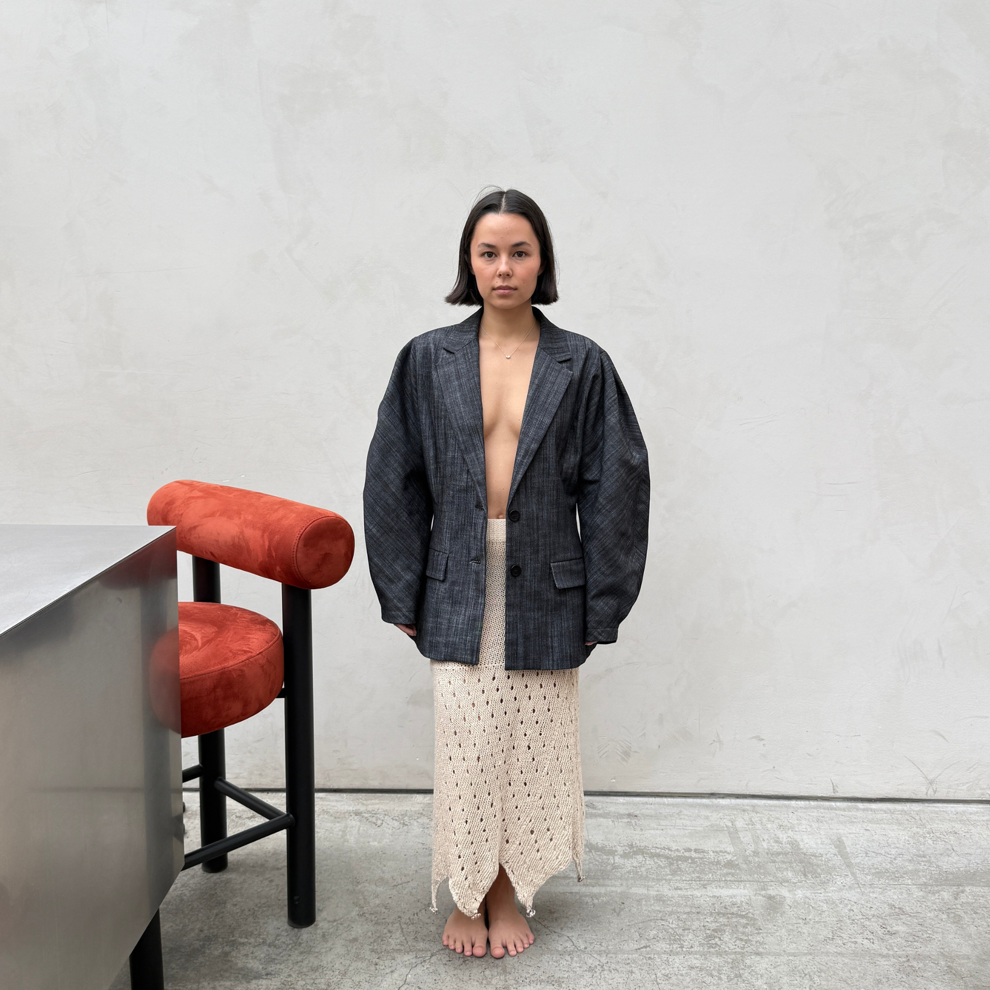 Givéh knitwear cotton hand crocheted skirt by female artisans in Iran, semi-sheer fitted silhouette with raw hem, lightweight spring summer skirt with adjustable length.