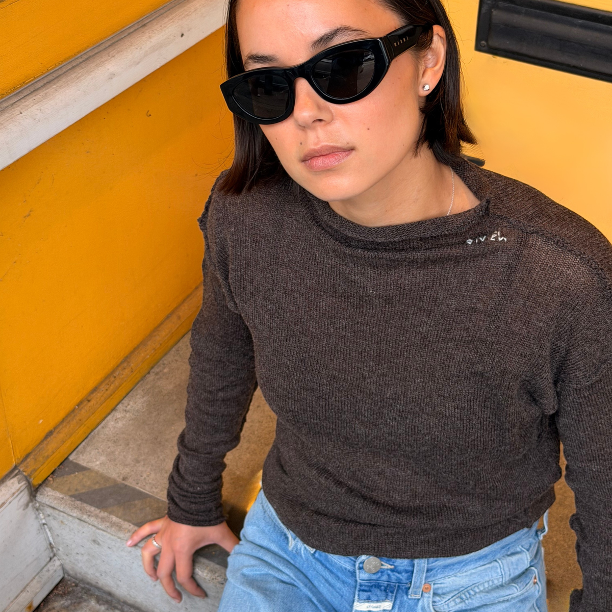 Givéh Panda mock-neck sweater in brown, a wool and cashmere knit by female artisans in Iran with an inside-out finish and embroidered Givéh lettering at the neckline