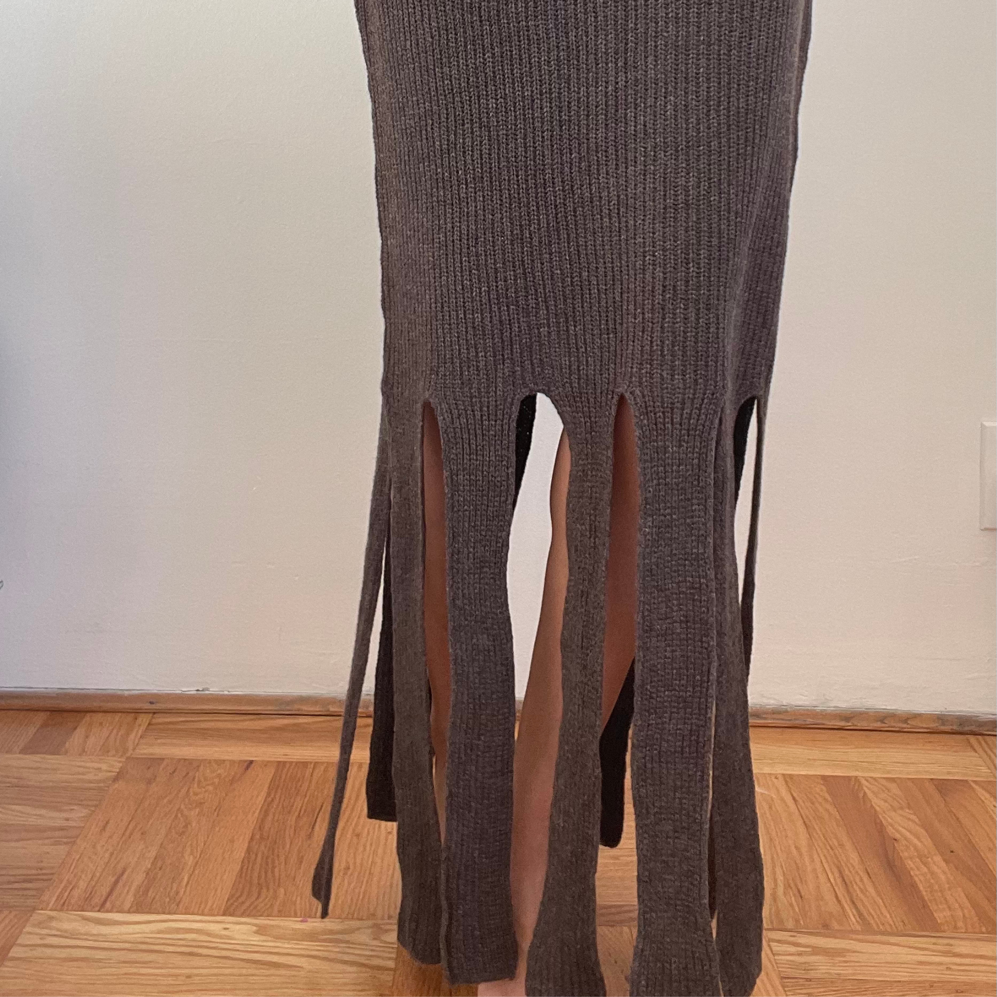 givéh knitwear handmade by female artisans in iran using only natural and recycled fibres. contemporary knitwear for cool people. brown skirt with handcrocheted edges. 100% merino wool. fall 2025 collection.
