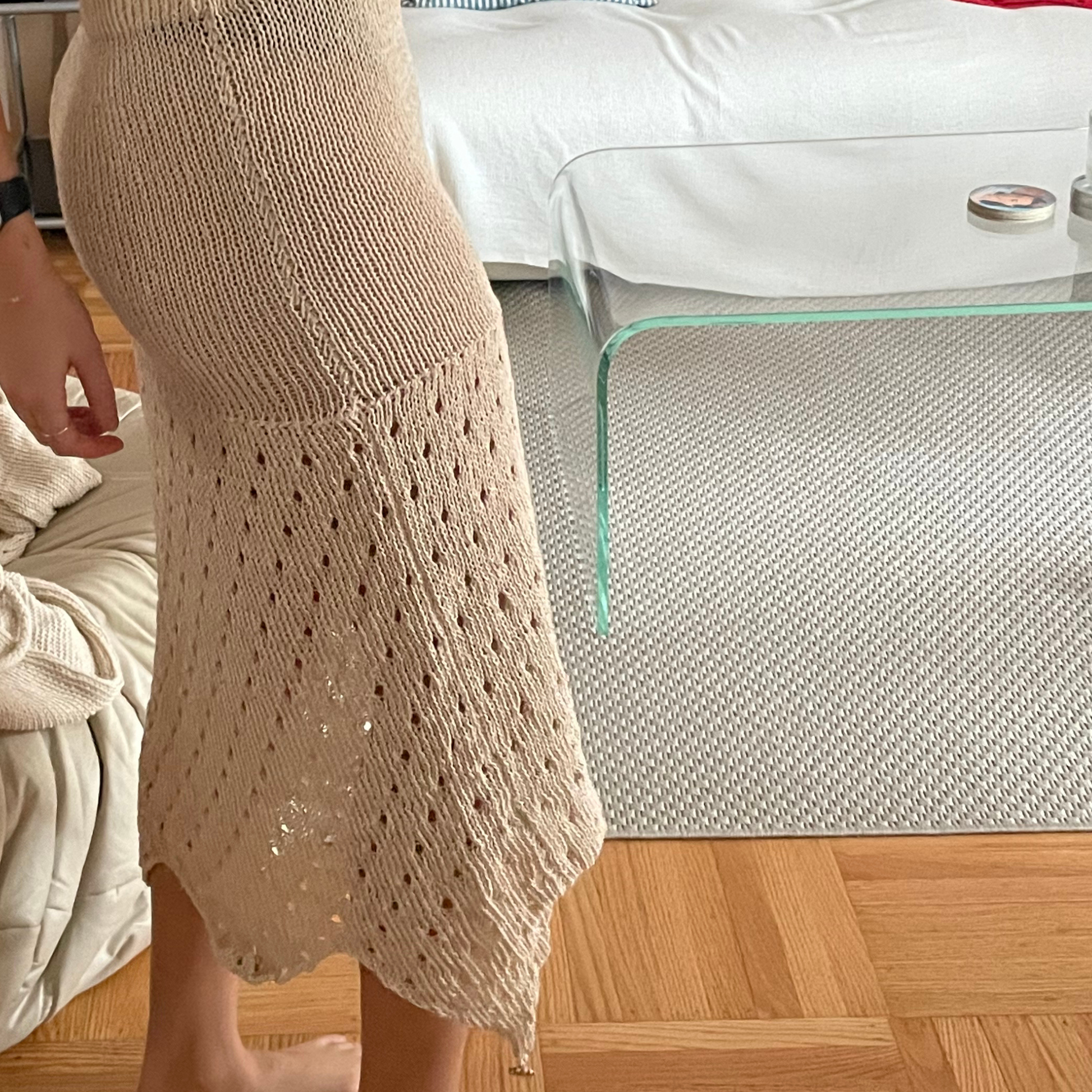 Givéh knitwear cotton hand crocheted skirt by female artisans in Iran, semi-sheer fitted silhouette with raw hem, lightweight spring summer skirt with adjustable length.
