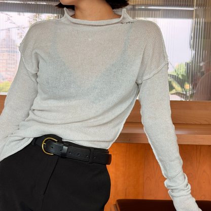 Givéh Panda mock-neck sweater in ivory, a wool and cashmere knit by female artisans in Iran with an inside-out finish and embroidered Givéh lettering at the neckline