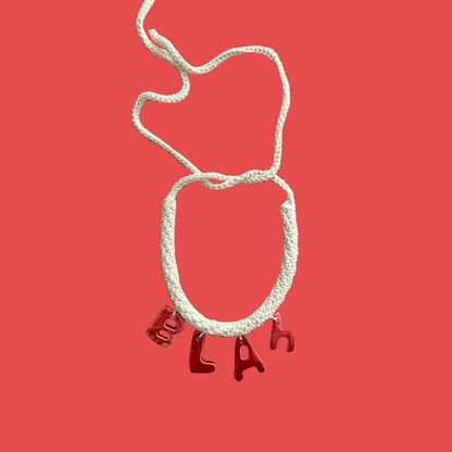 givéh knitwear handmade by female artisans in iran. blah hand crocheted undyed cotton necklace with handmade clay ceramic pendant.