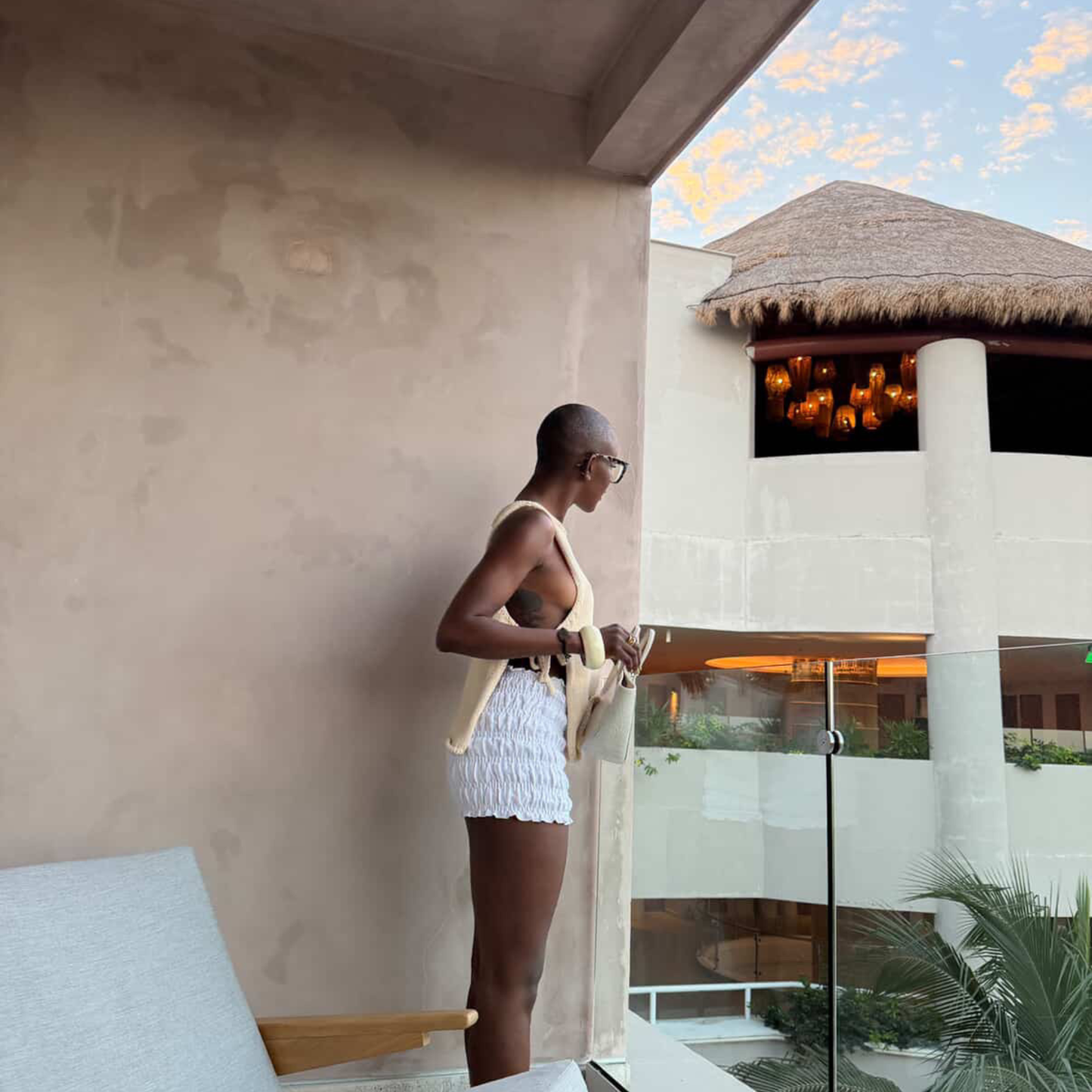 givéh knitwear handmade by female artisans in iran using only natural and recycled fibres. contemporary knitwear for cool people. cream tie top, cream open side top with tie closure and hand crocheted edges made out of cotton and recycled polyamide yarn. spring summer 2025 collection.