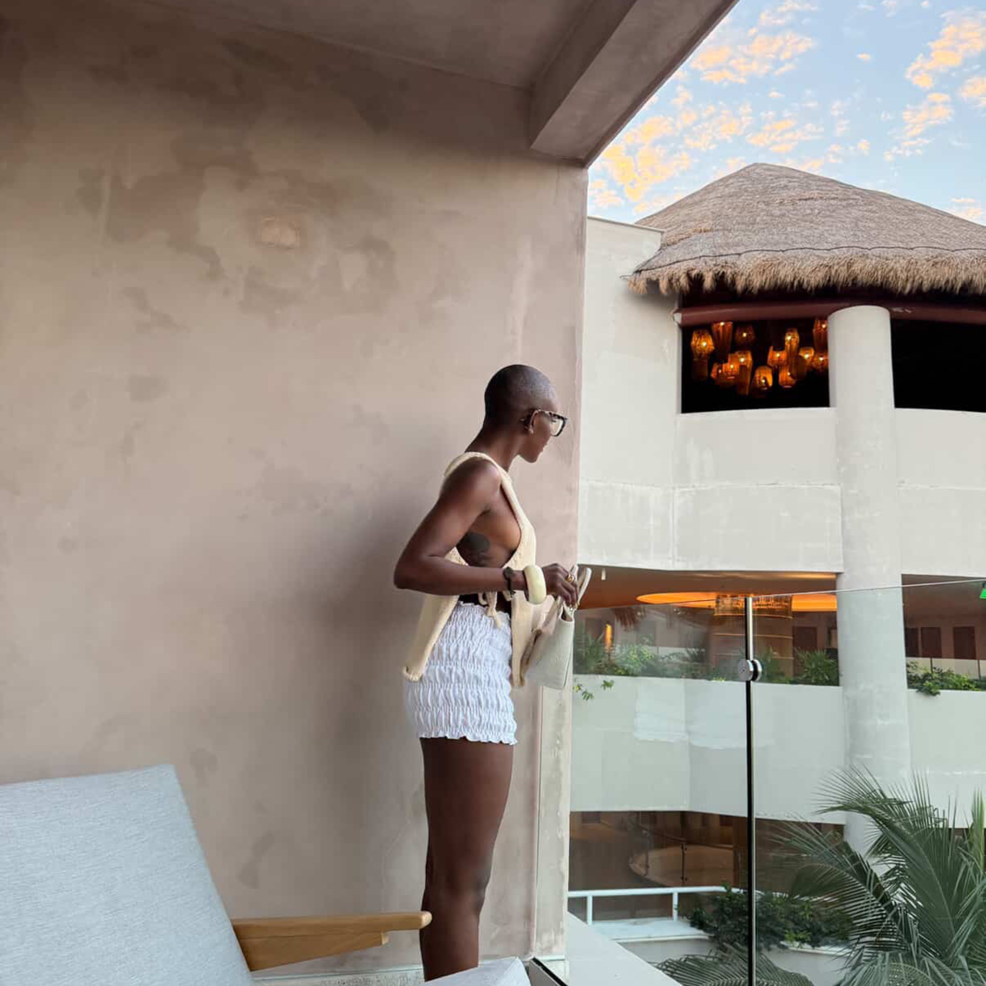 givéh knitwear handmade by female artisans in iran using only natural and recycled fibres. contemporary knitwear for cool people. cream tie top, cream open side top with tie closure and hand crocheted edges made out of cotton and recycled polyamide yarn. spring summer 2025 collection.