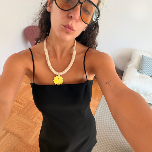 Givéh handmade cotton hand crocheted necklace by female artisans in Iran, adjustable tie-back with handmade ceramic sun pendant