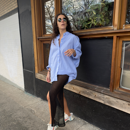givéh knitwear handmade by female artisans in iran using only natural and recycled fibres. contemporary knitwear for cool people. black kaj skirt, asymmetrical organic cotton skirt. spring summer 2025 collection.
