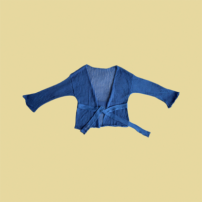 givéh knitwear handmade by female artisans in iran using only natural and recycled fibres. contemporary knitwear for cool people. darya cardi, blue knit cardigan with belt made of organic cotton yarn. spring summer 2025 collection.