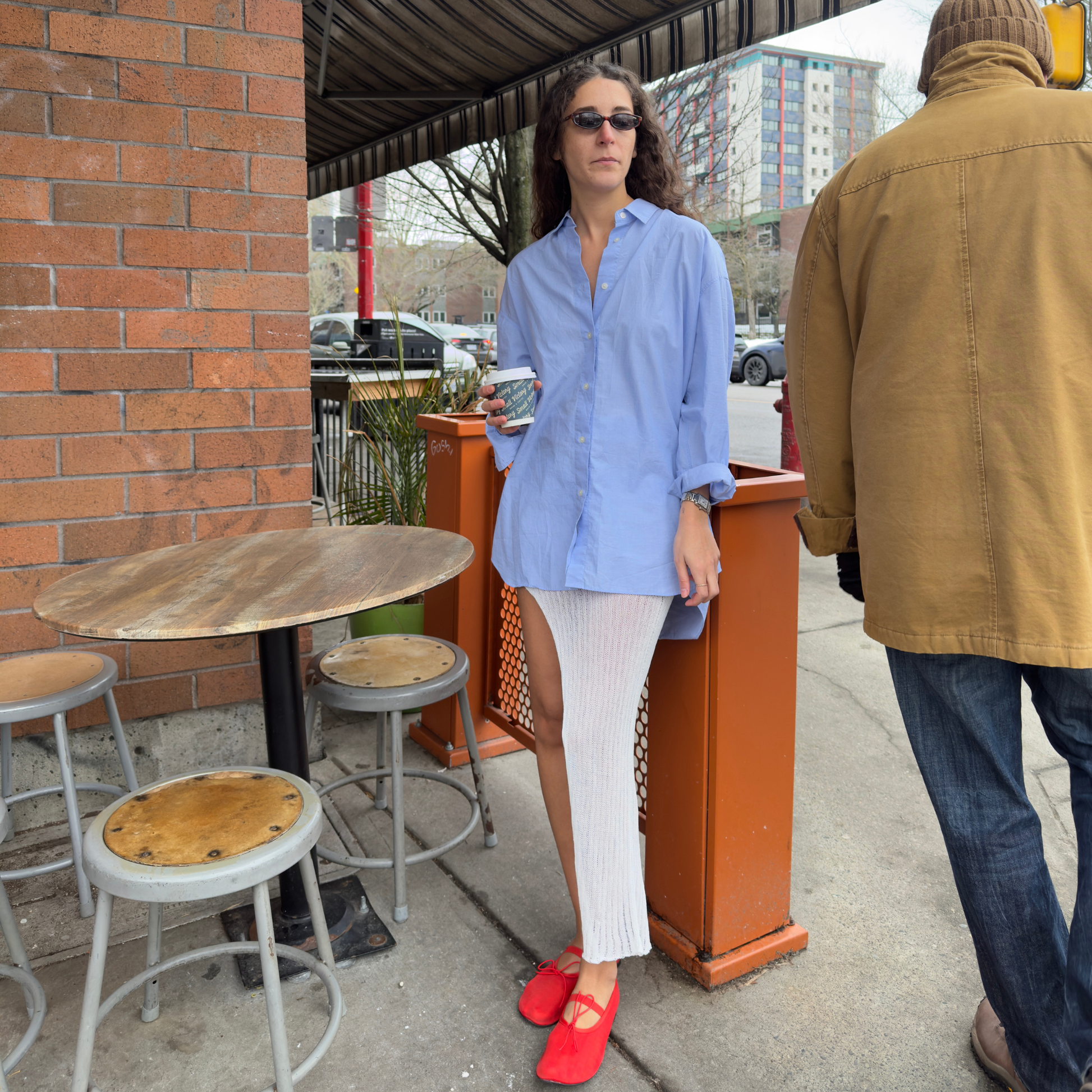 givéh knitwear handmade by female artisans in iran using only natural and recycled fibres. contemporary knitwear for cool people. white kaj skirt, asymmetrical organic cotton skirt. spring summer 2025 collection.